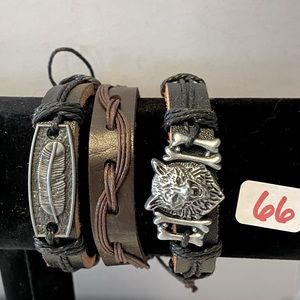 Three pc leather braclet set. As shown